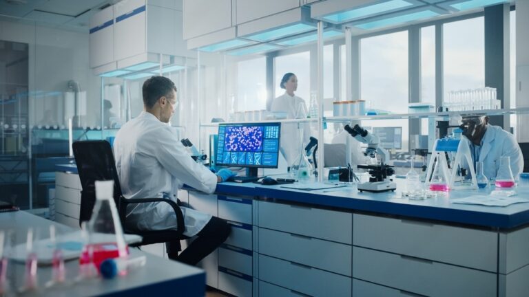 scientists in a biotechnolgy laboratory for micro algae